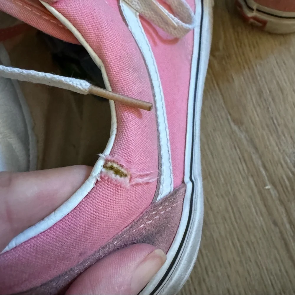 Pink and white Vans sneakers, lace up, suede tips, size 9.5 M or 11 W.